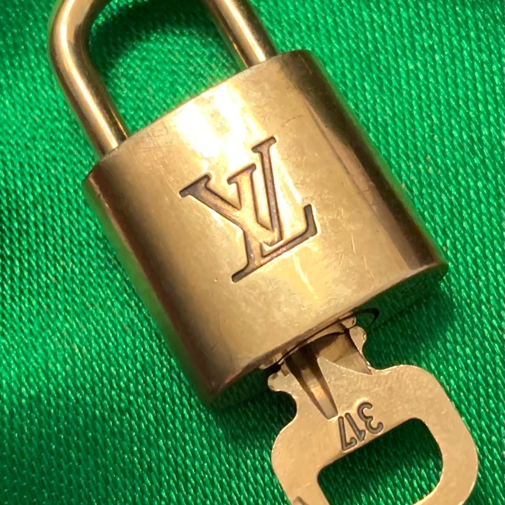 REDUCED!!!  #317 LOUIS VUITTON LOCK & KEY SET (set 2)